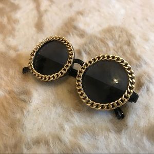 black and gold round sunglasses